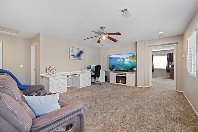 30336 Barcelona Rd, Castaic, CA 91384 - living area with a desk, light colored carpet, and a ceiling fan