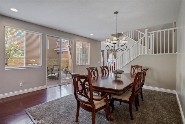 30336 Barcelona Rd, Castaic, CA 91384 - dining room with a chandelier, wood finished floors, stairs, and recessed lighting