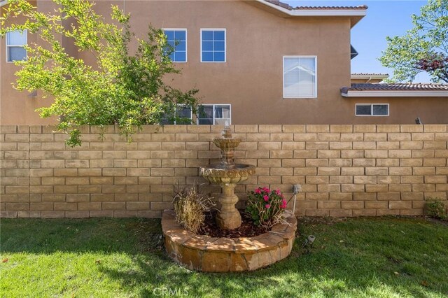 30336 Barcelona Rd, Castaic, CA 91384 - view of property exterior with stucco siding and a tiled roof