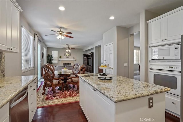 30336 Barcelona Rd, Castaic, CA 91384 - kitchen with white appliances, ceiling fan, dark wood-type flooring, healthy amount of natural light, and recessed lighting