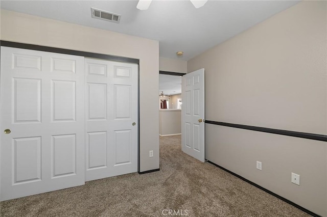 30336 Barcelona Rd, Castaic, CA 91384 - unfurnished bedroom featuring carpet floors, a closet, and ceiling fan