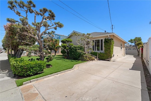 2012 Perry Ave, Redondo Beach, CA 90278 - view of front of property featuring a front lawn, stucco siding, and concrete driveway