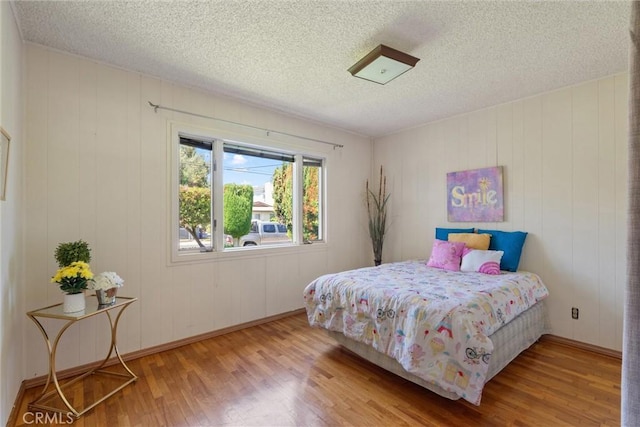 2012 Perry Ave, Redondo Beach, CA 90278 - bedroom featuring wood finished floors and a textured ceiling