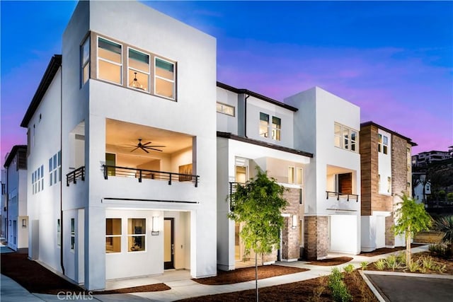 2626 Everly Dr, San Diego, CA 92108 - modern home featuring stucco siding, a balcony, and stone siding