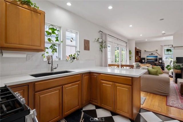 2848 S Kerckhoff Ave, San Pedro, CA 90731 - kitchen with plenty of natural light, light countertops, a peninsula, and recessed lighting