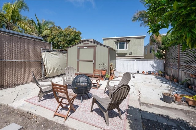 2848 S Kerckhoff Ave, San Pedro, CA 90731 - fenced backyard featuring a storage unit, a patio, and a fire pit