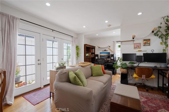 2848 S Kerckhoff Ave, San Pedro, CA 90731 - living room with healthy amount of natural light, wood finished floors, an office area, french doors, and recessed lighting