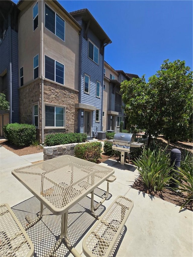 1014 Savi Dr Unit 104, Corona, CA 92878 - view of patio with a grill