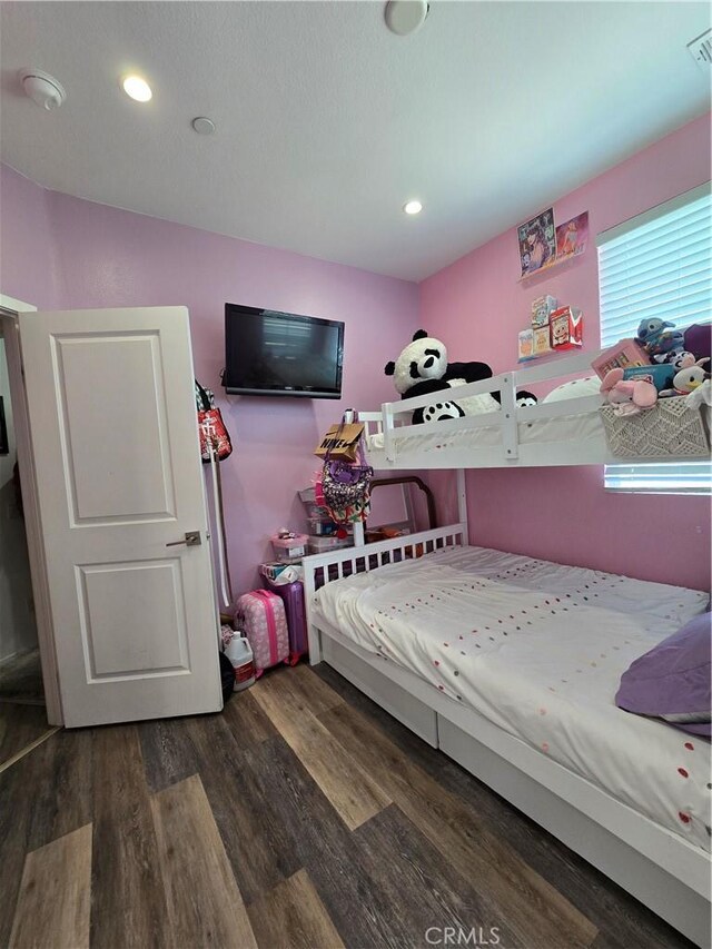1014 Savi Dr Unit 104, Corona, CA 92878 - bedroom with wood finished floors and recessed lighting