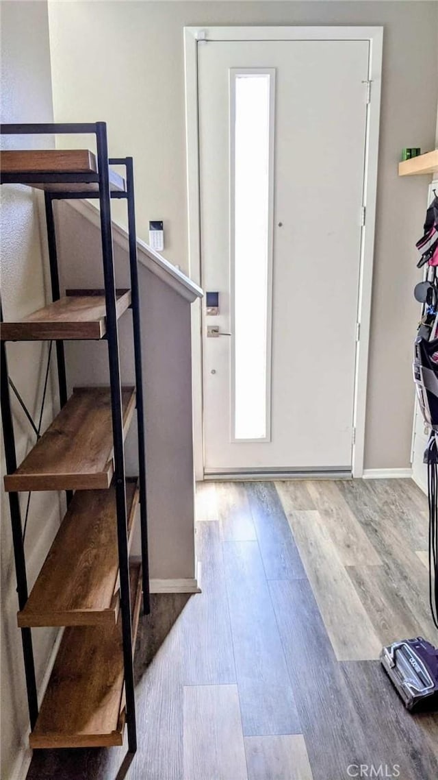 1014 Savi Dr Unit 104, Corona, CA 92878 - foyer entrance with wood finished floors