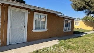 9957 Citrus Ave, Fontana, CA 92335 - view of side of home with stucco siding