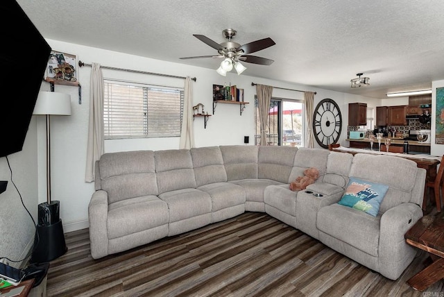 6743 Radio Dr, San Diego, CA 92114 - living area featuring a ceiling fan, wood finished floors, and a textured ceiling