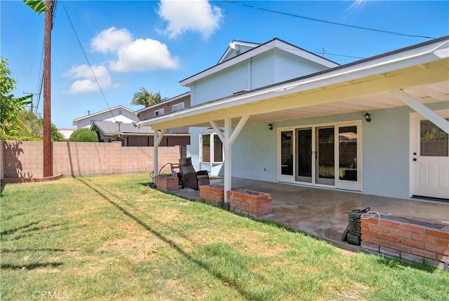 10415 Valley View Ave, Whittier, CA 90604 - rear view of house featuring stucco siding and a patio area