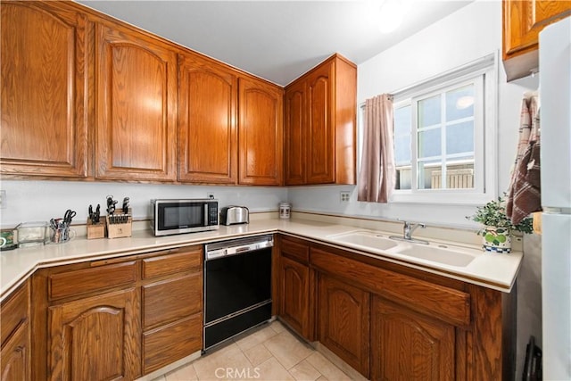 10415 Valley View Ave, Whittier, CA 90604 - kitchen featuring dishwasher, stainless steel microwave, brown cabinets, and light tile patterned flooring
