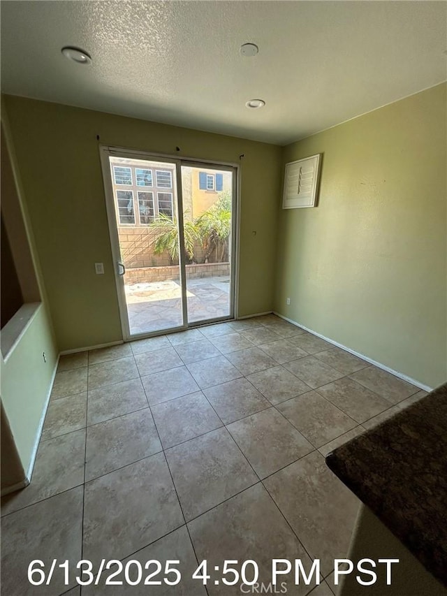 6921 Montego St, Chino, CA 91710 - tiled empty room with baseboards
