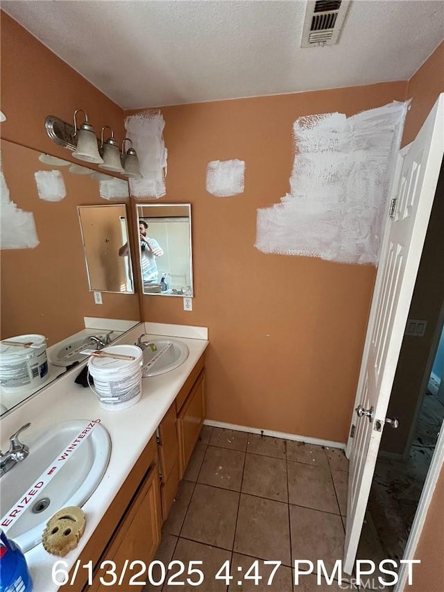 6921 Montego St, Chino, CA 91710 - full bath with double vanity and tile patterned floors
