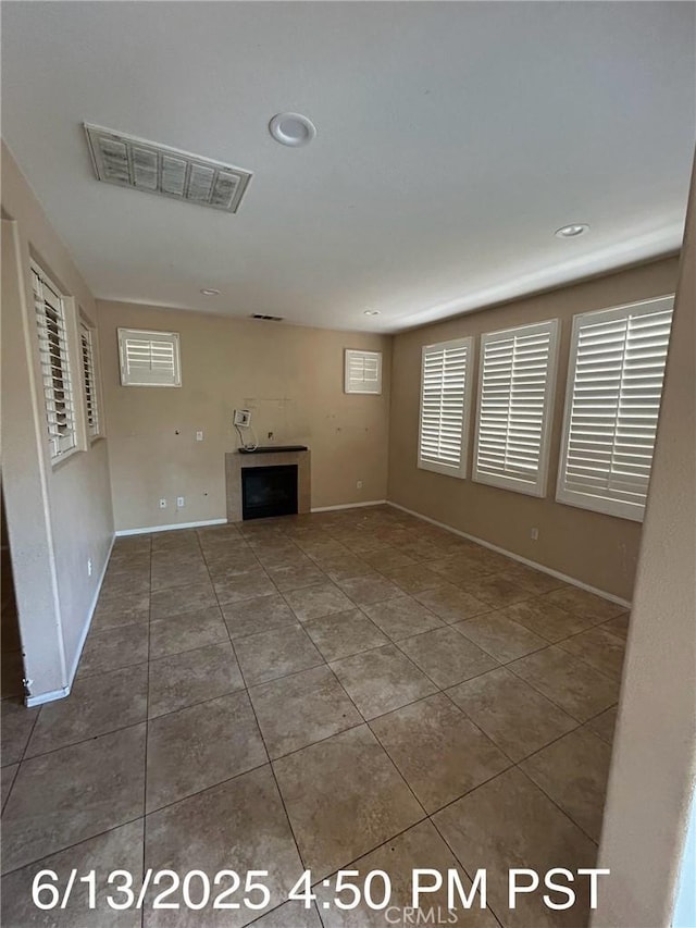 6921 Montego St, Chino, CA 91710 - unfurnished living room with tile patterned flooring and a fireplace