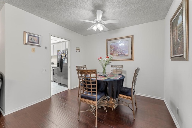 3500 W Manchester Blvd Unit 240, Inglewood, CA 90305 - dining room featuring a ceiling fan, a textured ceiling, and wood finished floors