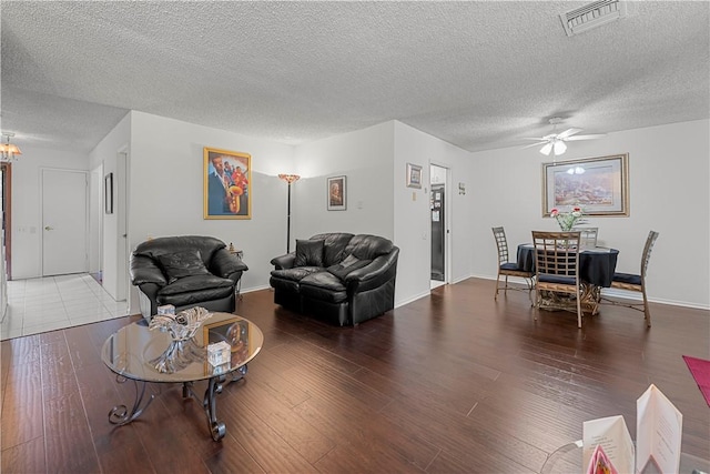 3500 W Manchester Blvd Unit 240, Inglewood, CA 90305 - living area with wood finished floors, a textured ceiling, and a ceiling fan
