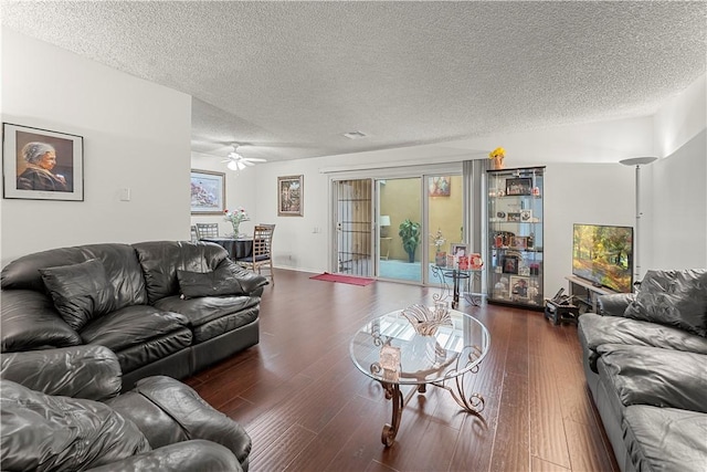 3500 W Manchester Blvd Unit 240, Inglewood, CA 90305 - living room featuring a textured ceiling, wood finished floors, ceiling fan, and healthy amount of natural light