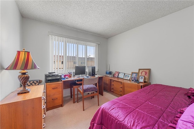 3500 W Manchester Blvd Unit 240, Inglewood, CA 90305 - bedroom with light carpet, a textured ceiling, and an office area