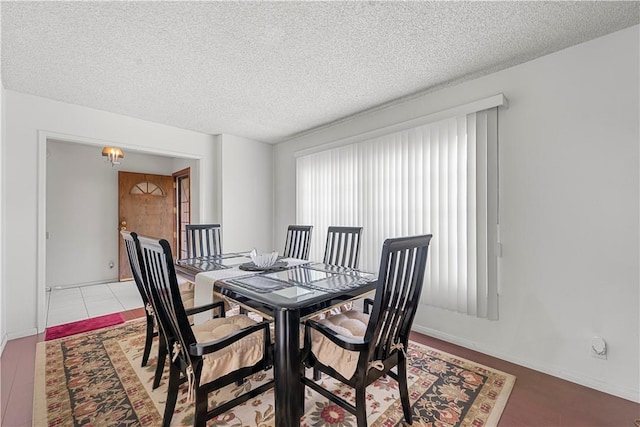 3500 W Manchester Blvd Unit 240, Inglewood, CA 90305 - dining space with a textured ceiling