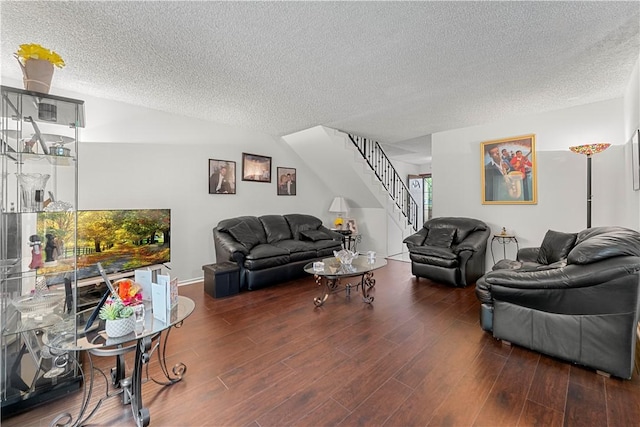 3500 W Manchester Blvd Unit 240, Inglewood, CA 90305 - living room featuring a textured ceiling, stairway, wood finished floors, and lofted ceiling