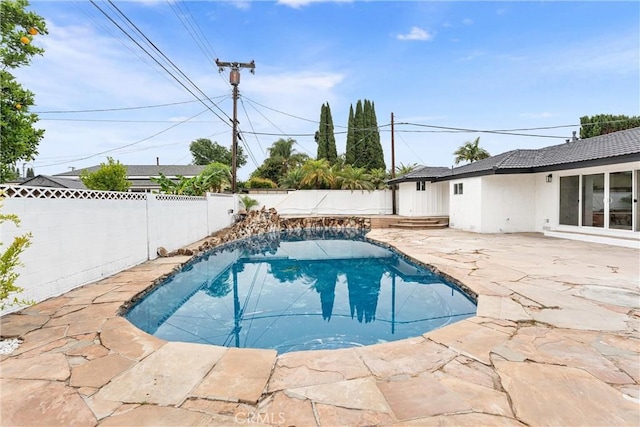8771 La Grand Ave, Garden Grove, CA 92841 - view of swimming pool featuring a fenced backyard and a patio