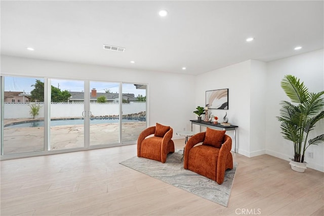 8771 La Grand Ave, Garden Grove, CA 92841 - sitting room featuring light wood-style floors and recessed lighting