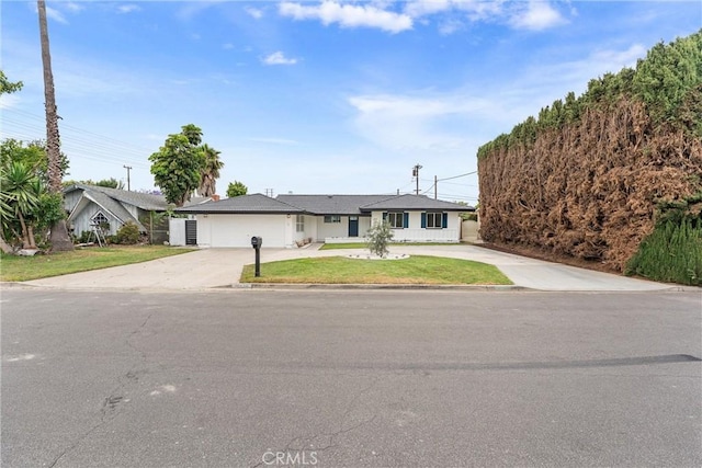 8771 La Grand Ave, Garden Grove, CA 92841 - ranch-style home with concrete driveway and a front yard