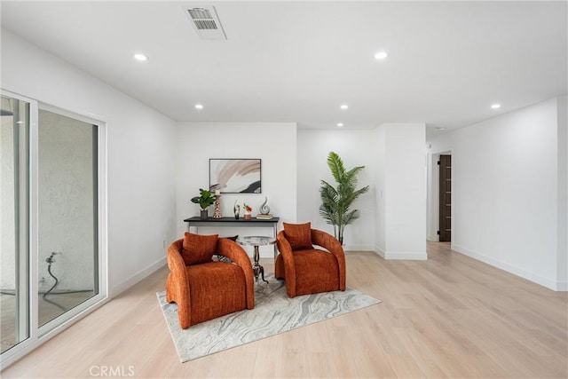 8771 La Grand Ave, Garden Grove, CA 92841 - living area featuring light wood-style flooring and recessed lighting