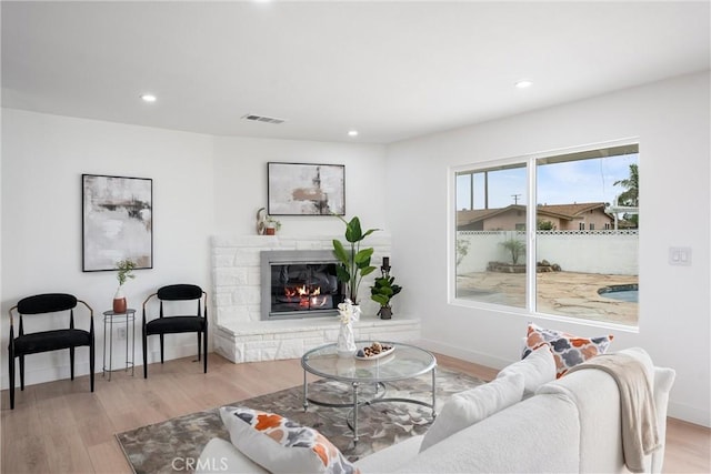8771 La Grand Ave, Garden Grove, CA 92841 - living area with a fireplace, wood finished floors, and recessed lighting