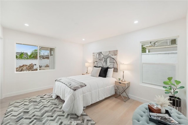 8771 La Grand Ave, Garden Grove, CA 92841 - bedroom featuring light wood-style flooring and recessed lighting