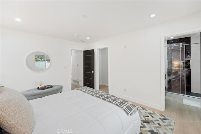 8771 La Grand Ave, Garden Grove, CA 92841 - bedroom featuring a spacious closet, wood finished floors, recessed lighting, and a closet