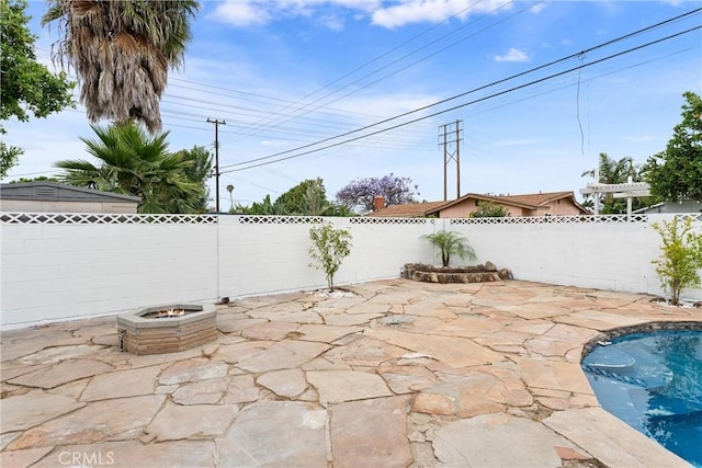 8771 La Grand Ave, Garden Grove, CA 92841 - fenced backyard with a patio and a fire pit