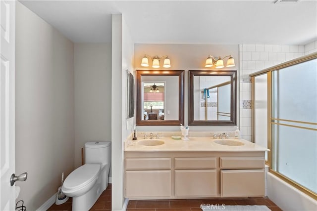 1142 Daisy Cir, Corona, CA 92882 - full bathroom featuring double vanity, tile patterned floors, and combined bath / shower with glass door