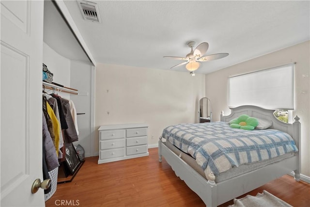 1142 Daisy Cir, Corona, CA 92882 - bedroom featuring wood finished floors and ceiling fan
