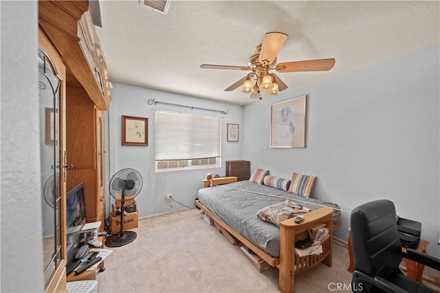 1142 Daisy Cir, Corona, CA 92882 - carpeted bedroom featuring a ceiling fan, a desk, and a textured ceiling
