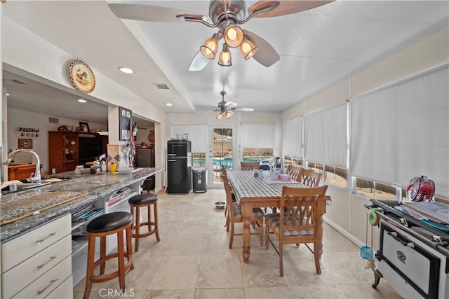 1142 Daisy Cir, Corona, CA 92882 - dining space featuring ceiling fan and light tile patterned floors