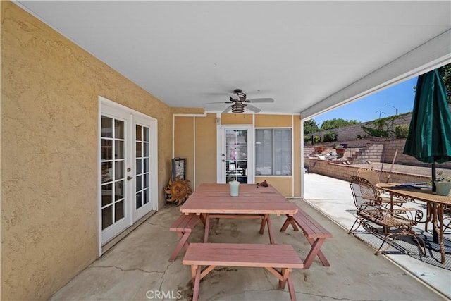 1142 Daisy Cir, Corona, CA 92882 - view of patio / terrace with french doors, outdoor dining space, and a ceiling fan