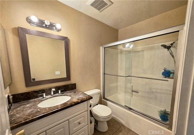 25632 Salerno Way, Yorba Linda, CA 92887 - bathroom with vanity, combined bath / shower with glass door, and tile patterned flooring