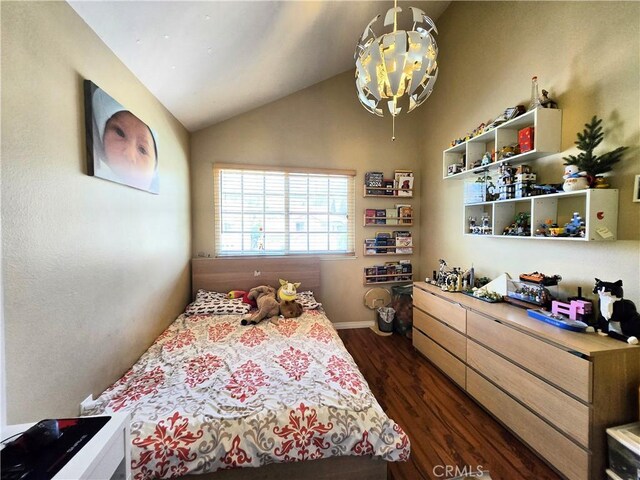 25632 Salerno Way, Yorba Linda, CA 92887 - bedroom featuring dark wood finished floors, vaulted ceiling, and a chandelier