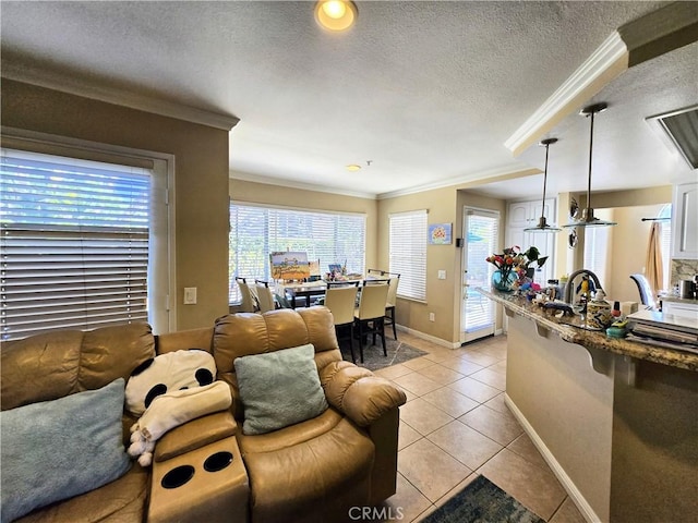 25632 Salerno Way, Yorba Linda, CA 92887 - living room with ornamental molding, light tile patterned flooring, healthy amount of natural light, and a textured ceiling