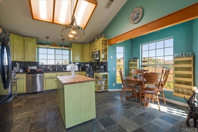772 Rainbow Crest Rd, Fallbrook, CA 92028 - kitchen featuring wood counters, appliances with stainless steel finishes, open shelves, backsplash, and high vaulted ceiling