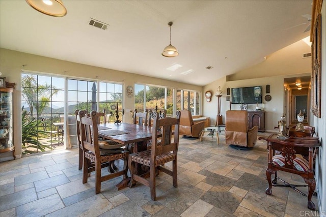 772 Rainbow Crest Rd, Fallbrook, CA 92028 - dining room featuring stone tile floors and vaulted ceiling