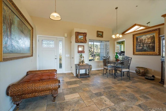 772 Rainbow Crest Rd, Fallbrook, CA 92028 - foyer featuring stone tile flooring and a chandelier