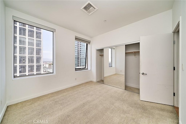 3810 Wilshire Blvd Unit 805, Los Angeles, CA 90010 - unfurnished bedroom featuring carpet and a closet