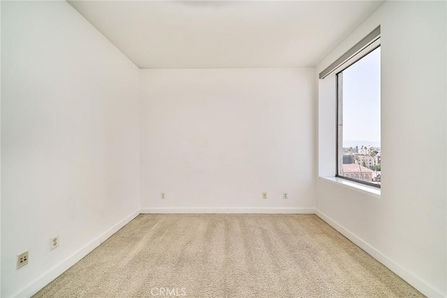 3810 Wilshire Blvd Unit 805, Los Angeles, CA 90010 - spare room featuring light carpet and baseboards