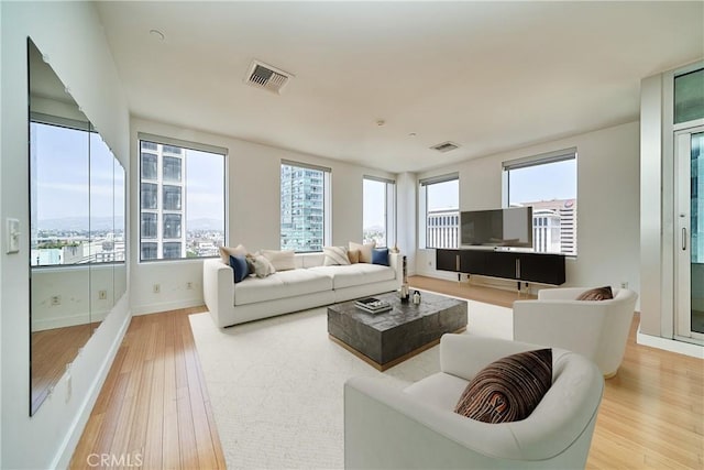 3810 Wilshire Blvd Unit 805, Los Angeles, CA 90010 - living room with wood finished floors and baseboards