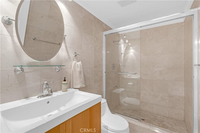 7505 Hampton Ave Unit 8, West Hollywood, CA 90046 - bathroom featuring tile walls, a stall shower, vanity, and crown molding